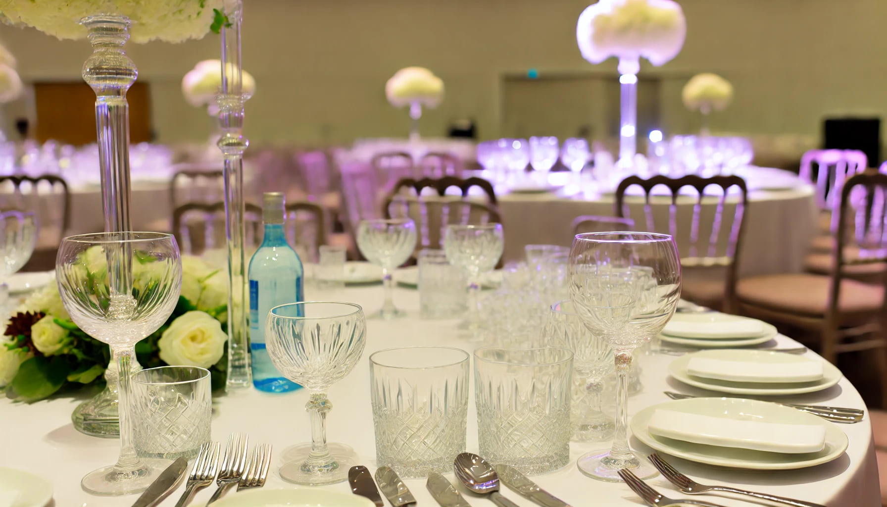 An elegant event setup with matching glassware, showcasing the enhanced look of coordinated glassware hire